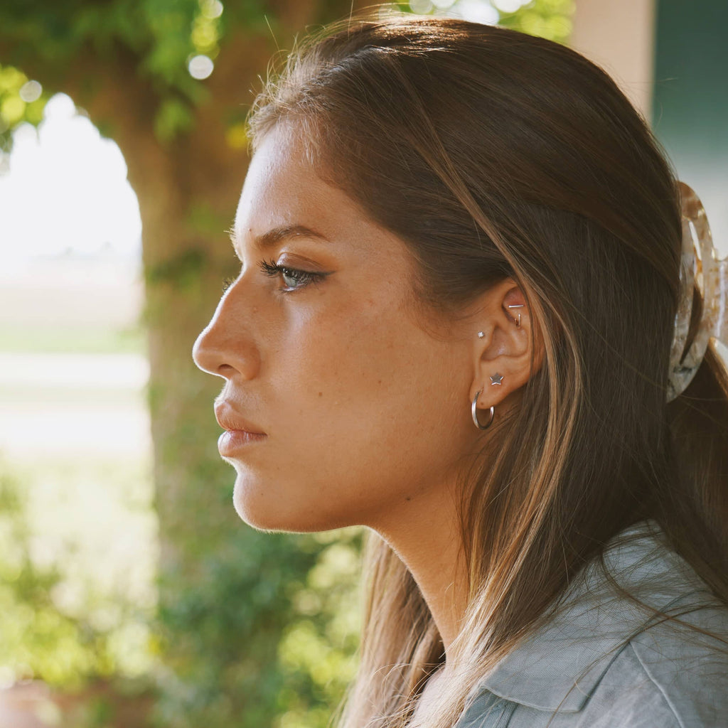 Besoin d'une boucle d'oreille en bâton