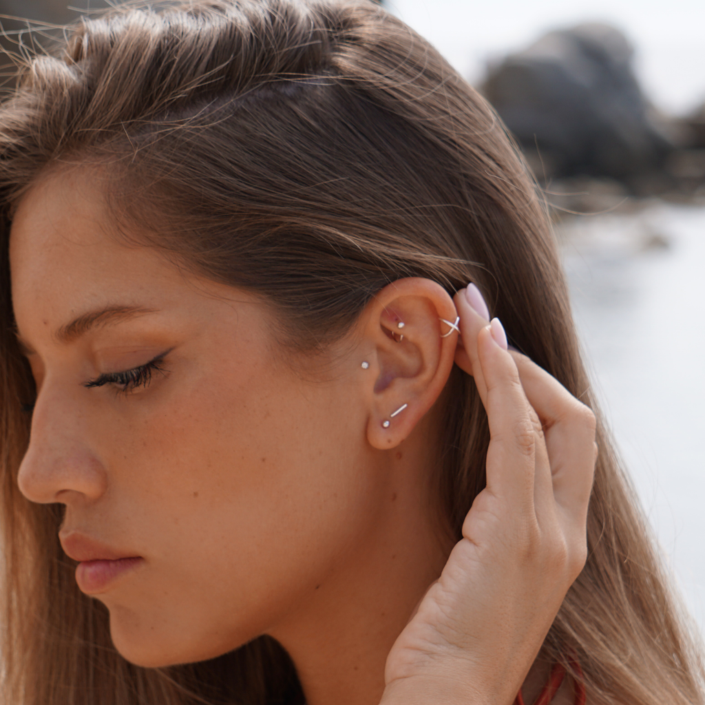 Fake silver earrings hotsell
